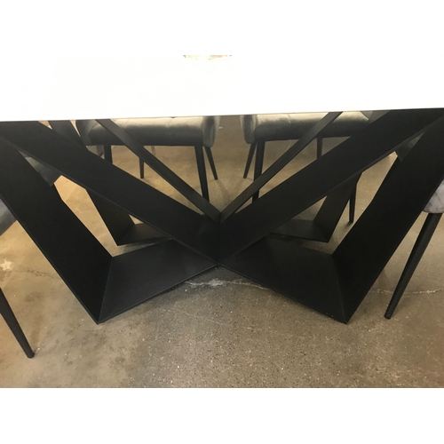 1350 - A Marvel dining table and six Kos granite chairs  * This lot is subject to VAT