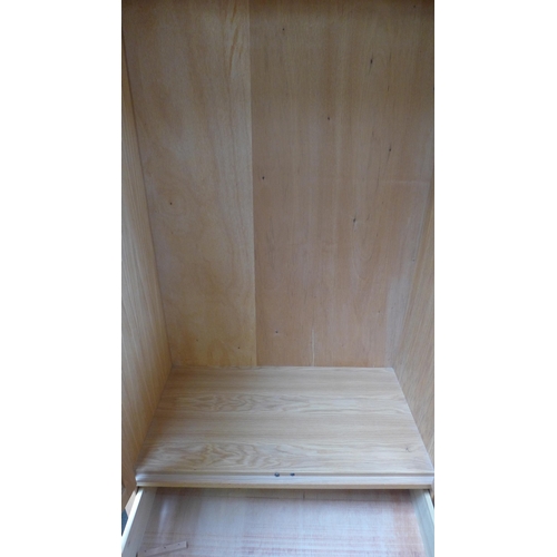 1502 - A lady's oak two door wardrobe with single drawer to the base (H=190 x W=110 x D=62cm)