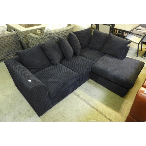 1541 - A black jumbo cord corner sofa (H=80 x W=217 x D=170cm)