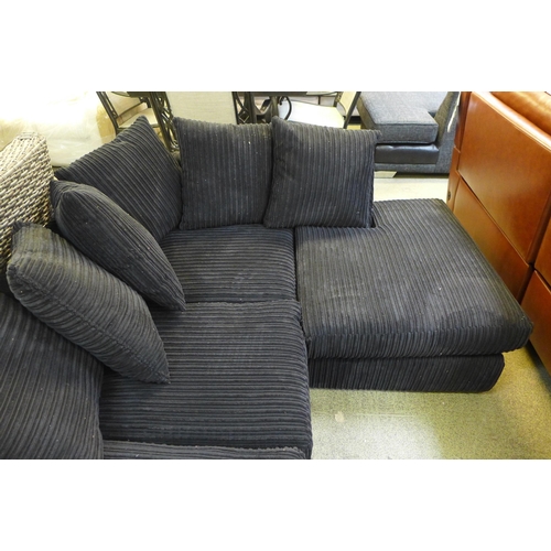 1541 - A black jumbo cord corner sofa (H=80 x W=217 x D=170cm)