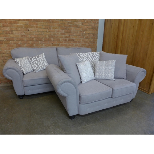 1542 - A Gracy parma violet upholstered buttoned four seater (W- 246cm D- 95cm H- 100cm)and two seater sofa... 