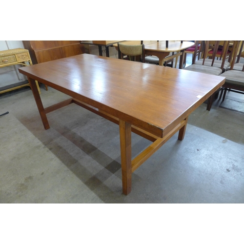 76 - A Staverton teak dining table