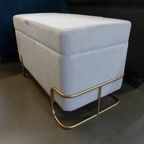 1311 - A cream storage stool with gold base