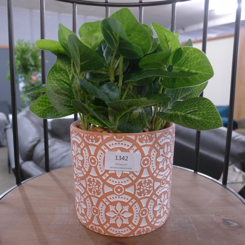 1342 - A faux green plant in a Moroccan tile pattern pot (63098104)