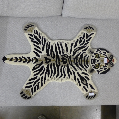 1356 - A child's rug in the form of a white tiger