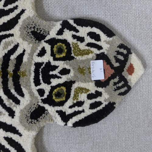 1356 - A child's rug in the form of a white tiger