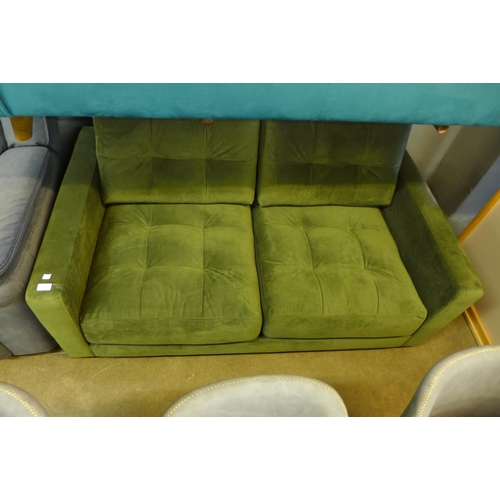 1391 - A forest green velvet pinched back two seater sofa