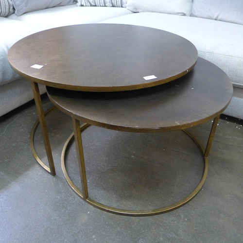 1395 - A gold circular nest of two tables