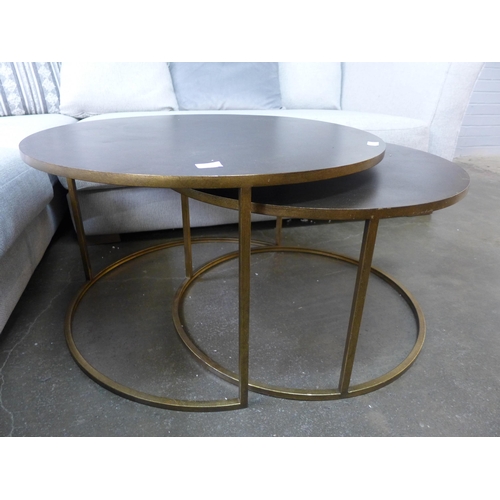 1395 - A gold circular nest of two tables