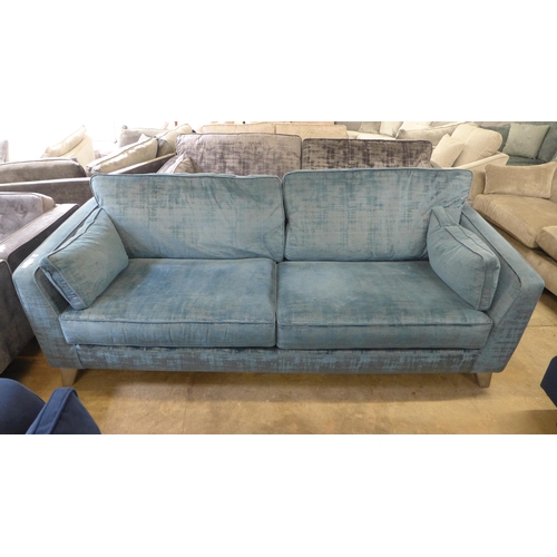 1411 - A Dolce aquamarine velvet four seater sofa