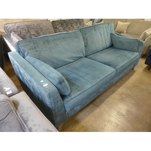 1411 - A Dolce aquamarine velvet four seater sofa