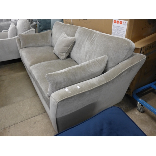 1422 - A mink upholstered three seater sofa