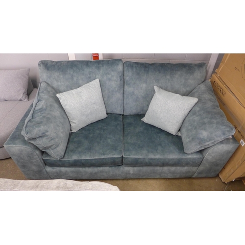 1432 - A teal shark skin upholstered two seater sofa