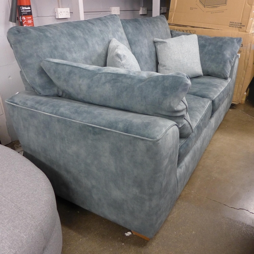 1432 - A teal shark skin upholstered two seater sofa