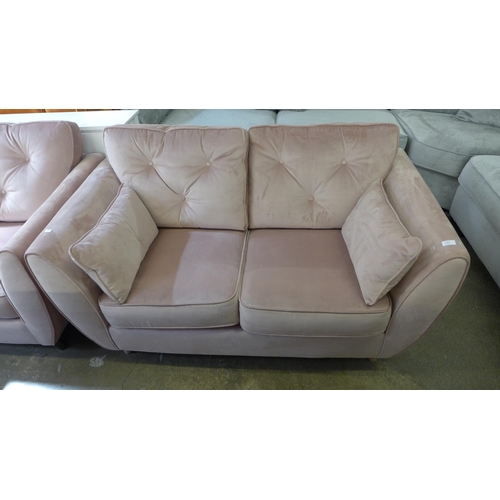 1435 - A Hoxton bubble gum pink button back velvet two seater sofa and armchair