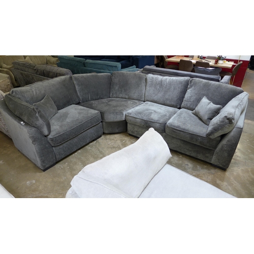 1437 - A Halley charcoal upholstered curved RHF corner sofa