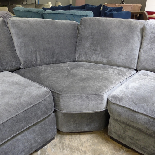 1437 - A Halley charcoal upholstered curved RHF corner sofa