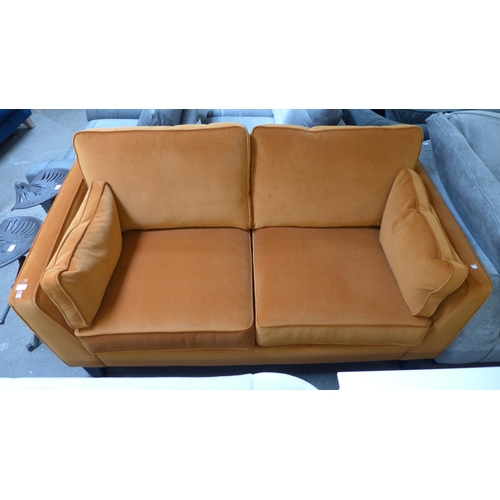 1439 - A Vincent burnt orange velvet 2.5 seater sofa