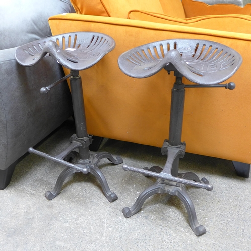 1440 - A pair of industrial style bar stools