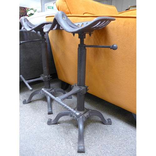 1440 - A pair of industrial style bar stools