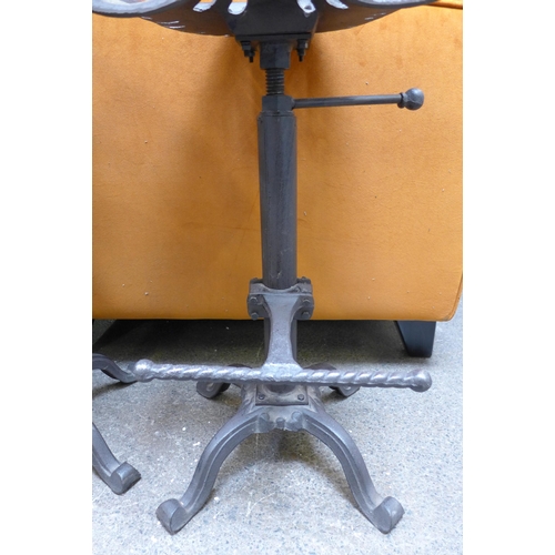 1440 - A pair of industrial style bar stools