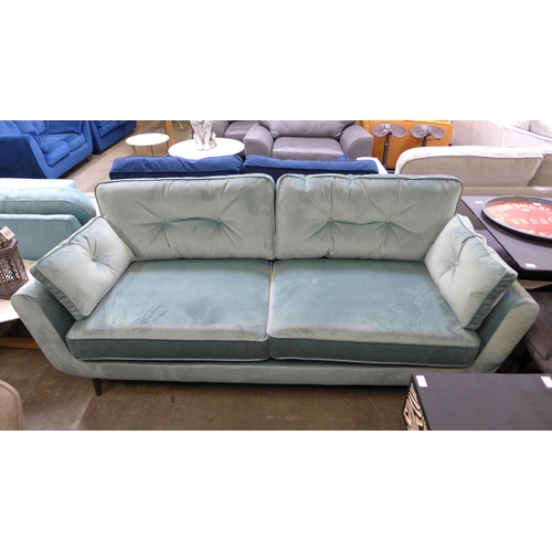 1456 - A Tiffany blue velvet button back four seater sofa