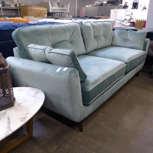 1456 - A Tiffany blue velvet button back four seater sofa