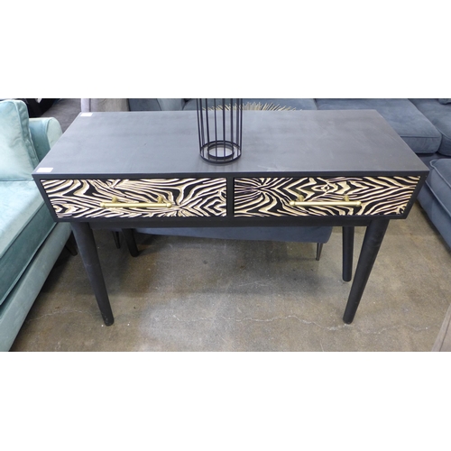 1457 - A zebra effect console table, damage to leg