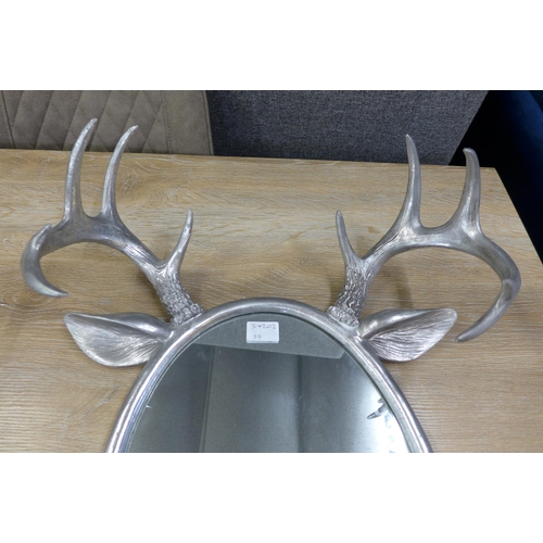 1465 - A silver stag horn mirror