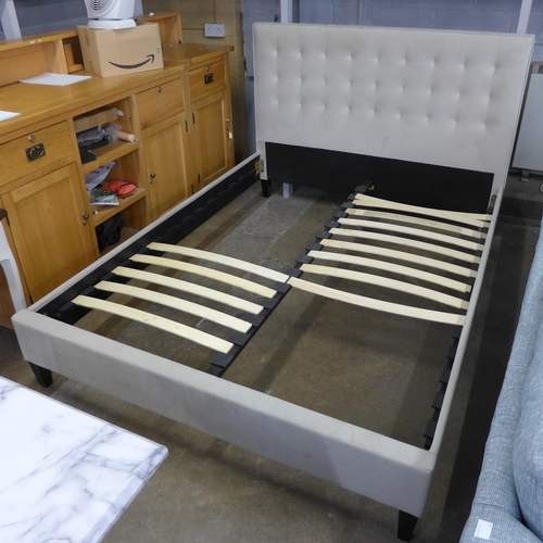 1479 - A champagne upholstered double bed frame, missing some slats