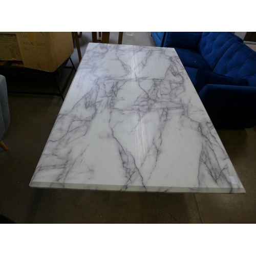 1487 - A marble effect dining table with chrome base, some marks to the top