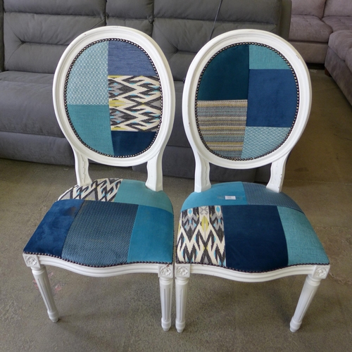 1520 - A pair of white painted and harlequin upholstered bedroom chairs - some marks