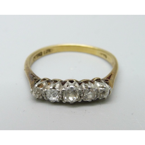 1002 - An 18ct gold, platinum set five stone diamond ring, 2.5g, O