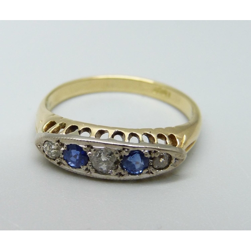 1021 - An 18ct gold, sapphire and diamond ring, 4g, P