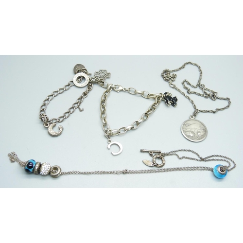 1032 - A Thomas Sabo bracelet, a silver bracelet, a silver St. Christopher pendant, etc.