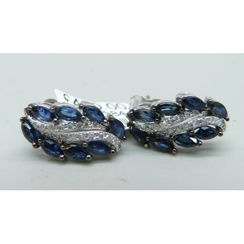 1044 - A pair of 9ct gold, diamond and sapphire earrings, 2.6g