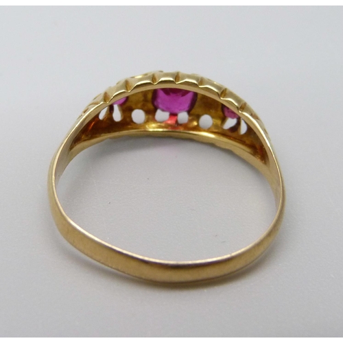 1046 - An 18ct gold, diamond and ruby ring, 2.5g, O