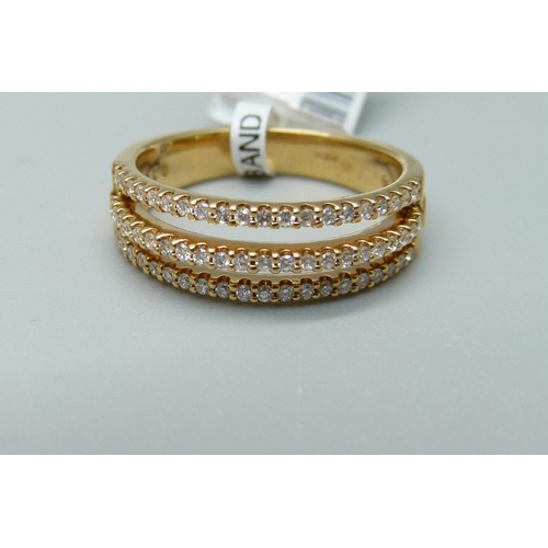 1048 - An 18ct gold, three row diamond ring, 5g, M