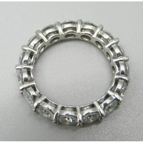 1049 - A silver and moissanite eternity ring, Q