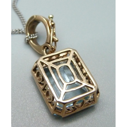 1050 - A 9ct gold, diamond and aquamarine pendant