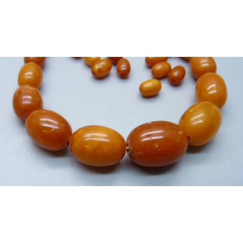 1055 - Two sets of butterscotch amber beads