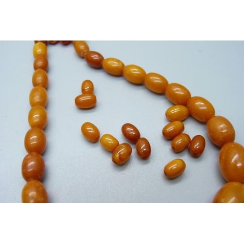 1055 - Two sets of butterscotch amber beads