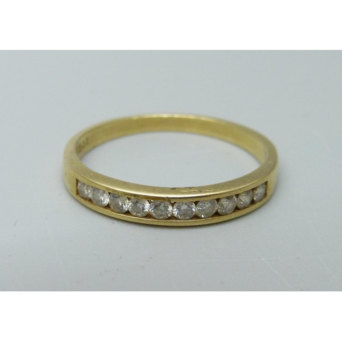 1062 - An 18ct gold, ten stone diamond ring, 2.2g, N