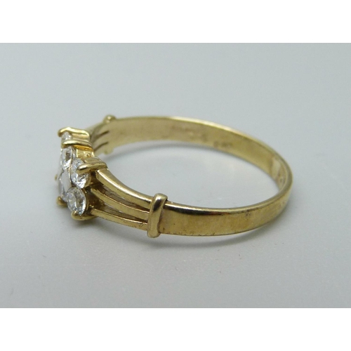 1063 - A 9ct gold and white stone ring, 1.7g, O