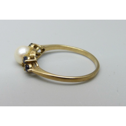 1064 - A 9ct gold, pearl and blue stone ring, 1.5g, N, lacking one blue stone