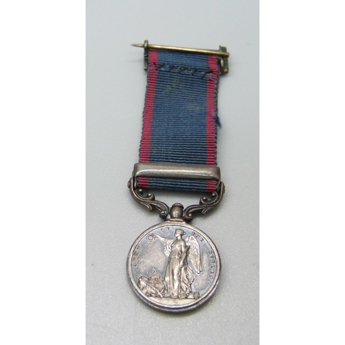 1065 - A Victorian miniature medal, with Sabraon clasp