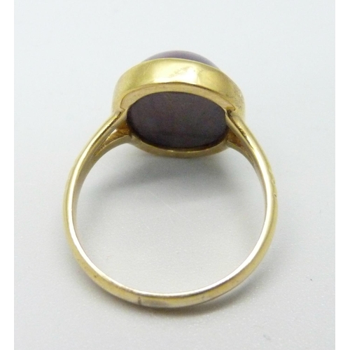 1072 - A star sapphire cabochon ring, 6.9g, Q