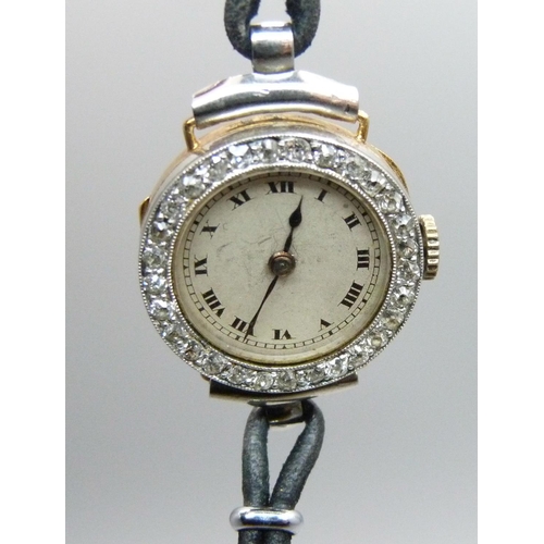 1082 - A lady's 18ct gold and diamond bezel Movado wristwatch