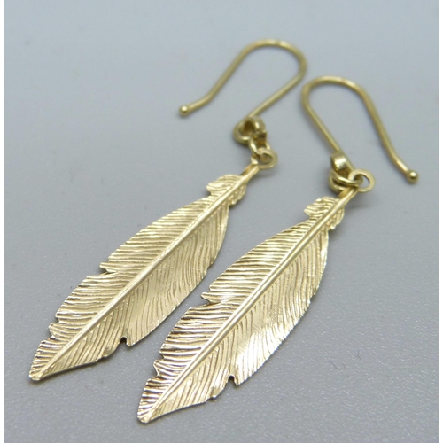 1083A - A pair of 9ct gold leaf shaped earrings, 1.3g