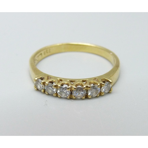 1088 - An 18ct gold and six stone diamond ring, 2.7g, L